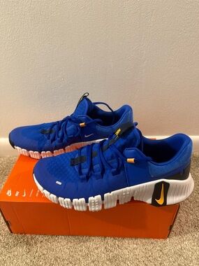 Nike Men’s MetconRoyal Blue Athletic Sneakers with White Sole and Yellow Accents